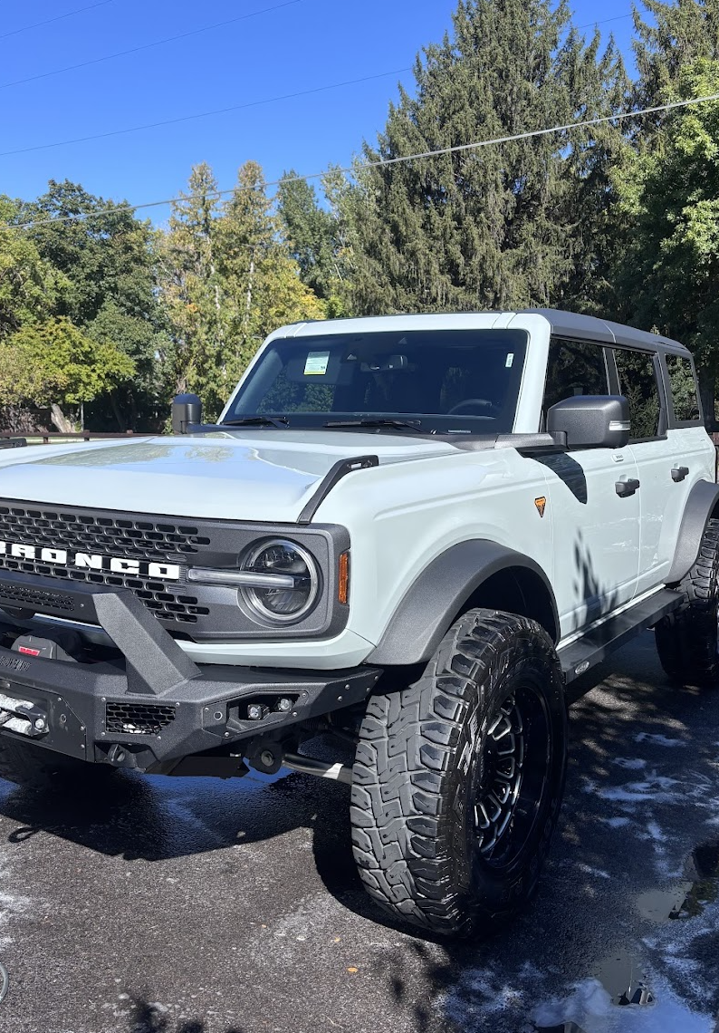 White Ford Bronco with off-road tires after a mobile detail in Orem, Utah