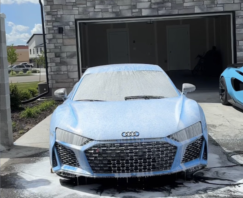 Audi R8 covered in foam during a mobile hand wash in Utah County